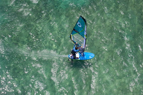 Fanatic Gecko Foil LTD windsurf board 135L during windsurfing on turquoise water