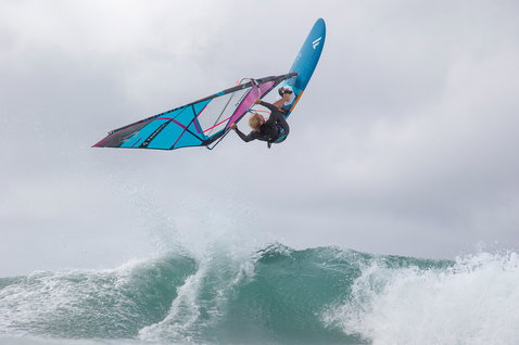 Fanatic FreeWave TE wave windsurf board during aerial wave riding on the ocean