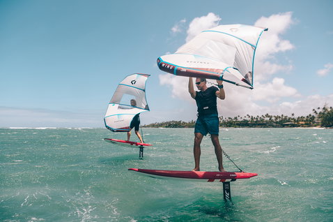 Fanatic Sky SUP foil board 6'11" during wing foiling on a tropical ocean lagoon