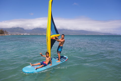 Duotone Viper Air inflatable windsurf SUP board 355cm in light blue during windsurfing on tropical ocean