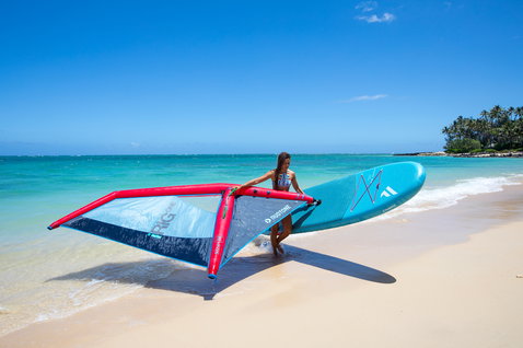 Duotone Viper Air inflatable windsurf SUP board 355cm in ocean blue during windsurfing at tropical beach