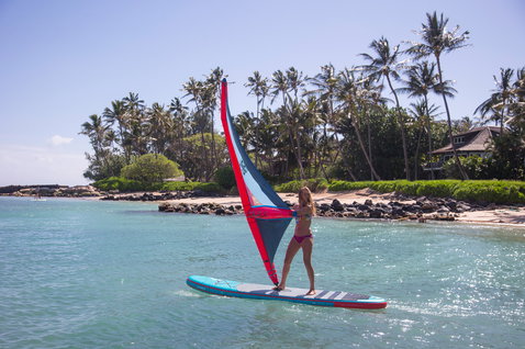 Duotone Viper Air inflatable windsurf SUP board 355cm in teal during windsurfing in a tropical lagoon