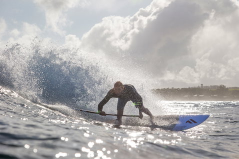 Duotone ProWave LTD wave SUP board during wave riding on the ocean