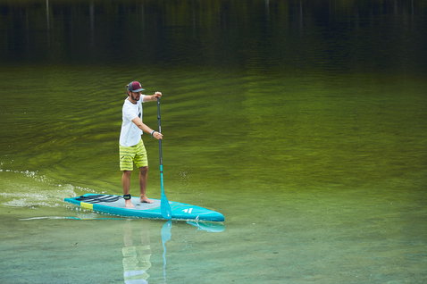 Fanatic Ray LTD composite SUP touring board 12'6"×28.5" during stand up paddling on a lake