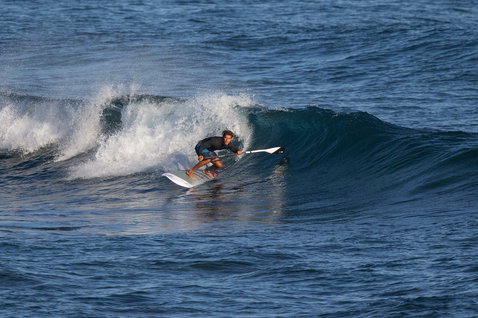 Duotone SUP Carbon Pro 100 Adjustable paddle during wave SUP surfing on the ocean
