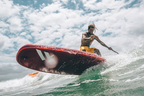 Duotone SUP Stubby Air inflatable wave SUP 8'6" during SUP wave riding on the ocean