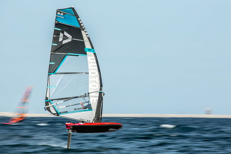 Fanatic Falcon Foil TE windsurf foil board during foiling on the ocean in red