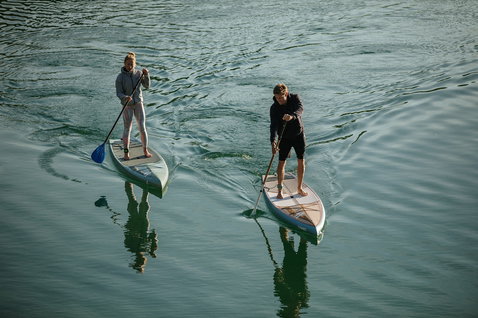 Fanatic Ray Bamboo Edition SUP touring board 12'6" during stand-up paddling on calm water
