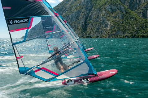 Fanatic Falcon TE slalom windsurf board during windsurfing on a mountain lake with Duotone sails