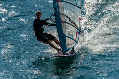 Fanatic Falcon Slalom TE race windsurf board during windsurfing on Lake Garda
