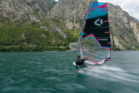 Fanatic Jag LTD windsurf board during windsurfing on a mountain lake with Duotone sail