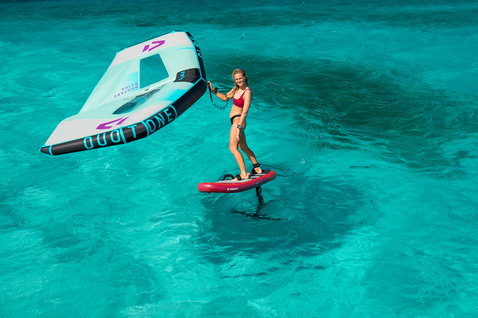Fanatic Sky Air Premium inflatable foil board during wing foiling in tropical shallow water