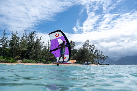 Fanatic Fuselage AL 3.0 during wing foiling on the ocean with Duotone Bee wing in purple