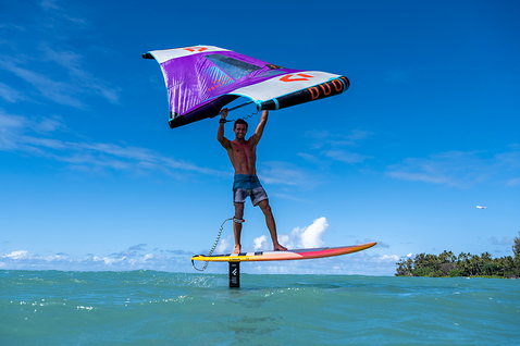Fanatic Bee Wing foil wing during wing foiling above turquoise tropical ocean water