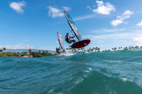 Fanatic FreeWave TE windsurf board during wave riding in a tropical ocean bay