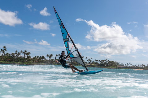 Fanatic FreeWave TE windsurf board during wave riding in a tropical bay