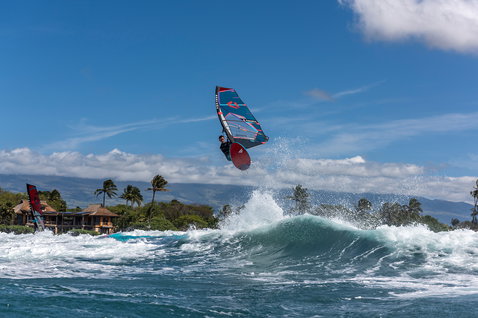 Fanatic FreeWave TE wave windsurf board during wave riding at a tropical ocean coast