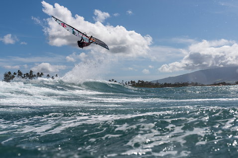 Fanatic FreeWave TeXtreme wave windsurf board during wave riding at a tropical reef break
