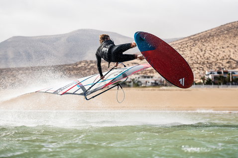 Fanatic Skate TE freestyle windsurf board during aerial freestyle windsurfing at the beach