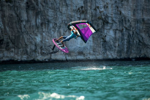 Fanatic Sky Wing foil board during wing foiling action at Garda Lake with rider airborne