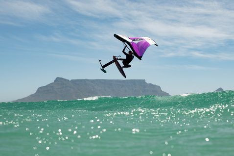 Fanatic Sky Wing foil board during wing foiling above the ocean with Table Mountain in the background