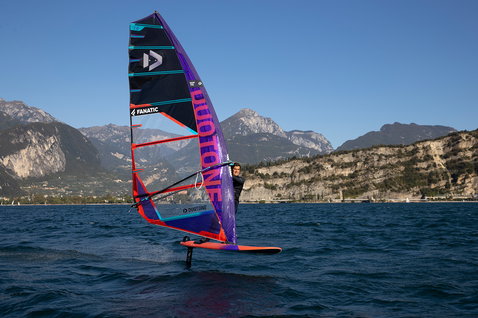 Fanatic Falcon Lightwind foil windsurf board 159 during foiling on an alpine lake with Duotone sail