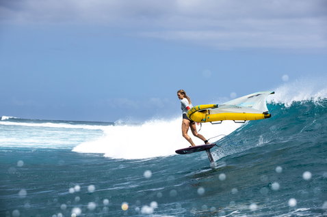 Fanatic X Duotone Carbon TE mast and fuselage set during wing foiling on a tropical ocean wave