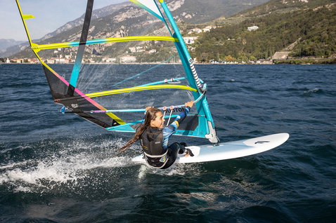 Fanatic Gecko HRS freeride windsurf board during windsurfing on an alpine lake