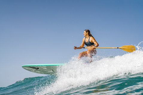 Duotone Bamboo Carbon 50 Slim SUP paddle during wave SUP surfing on the ocean