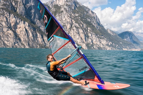 Fanatic Falcon Slalom TE windsurf board during slalom racing on an alpine lake