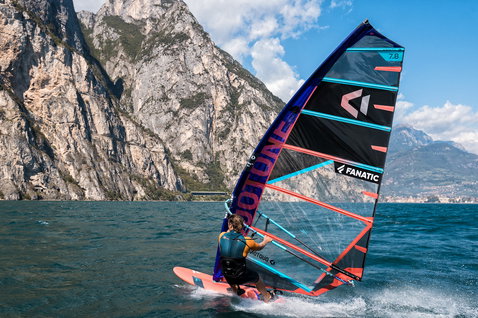Fanatic Falcon Slalom TE race windsurf board during windsurfing on an alpine lake with Duotone sail