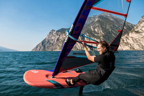 Fanatic Falcon Foil windsurf foil board 180L during foiling on a mountain lake