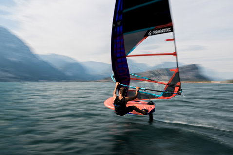 Fanatic Falcon Foil TE foil windsurf board during foiling on an alpine lake