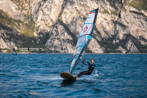Fanatic Gecko Eco freeride windsurf board during windsurfing on a mountain lake