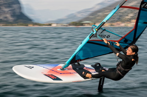 Fanatic Gecko Foil HRS windsurf foil board 135L during foiling on a mountain lake