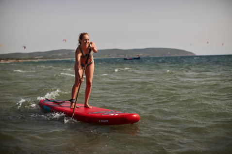 Duotone Fly Air inflatable SUP board during stand-up paddling on open sea