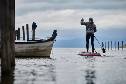 Fanatic Falcon Air Premium inflatable SUP raceboard during paddling on calm lake